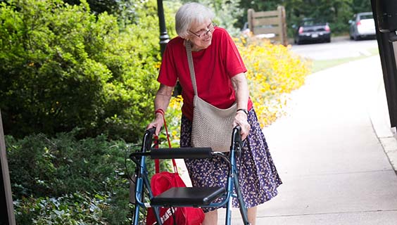 Elderly woman taking a walk